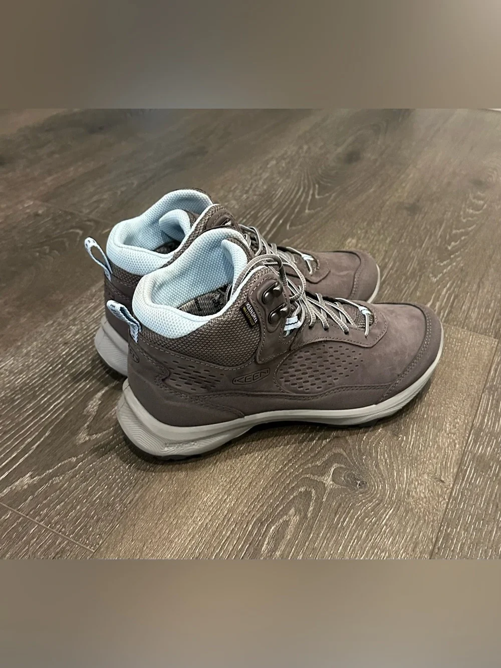 KEEN Gray Lace-Up Women's Hiking Boots with Light Blue Lining.